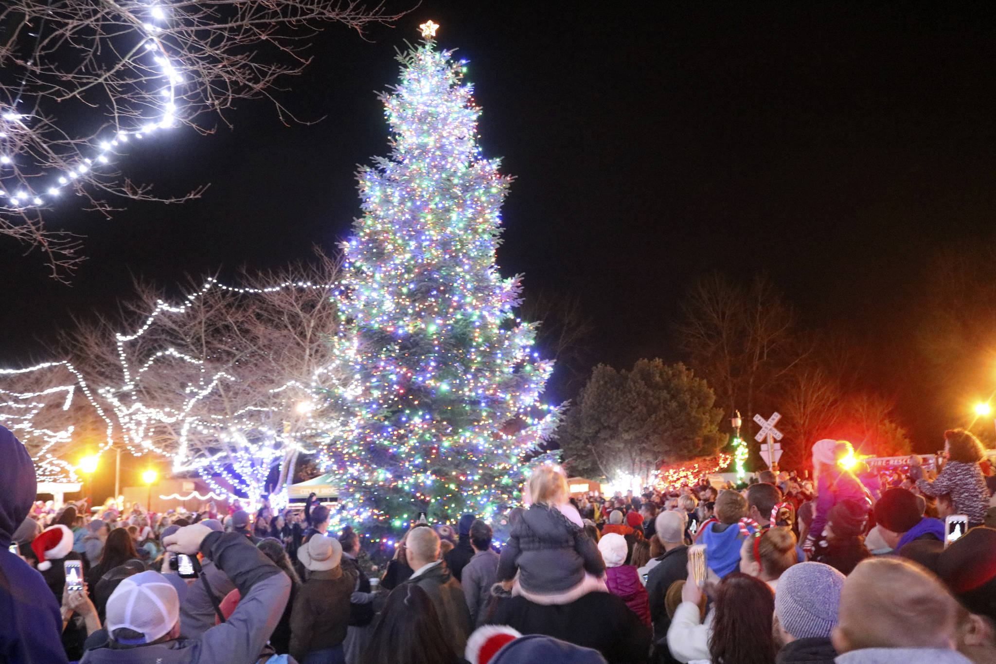 Hundreds of Snoqualmie citizens gather on Railroad Avenue for the 2018 tree lighting. This year, the event will be on Dec. 7. Evan Pappas/File photo