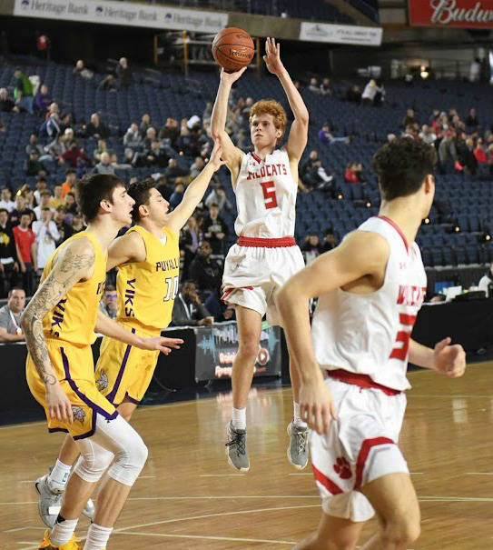 Mount Si guard Jabe Mullins (5) takes a shot during last years 4A state tournament. Mullins will be one of the key pieces for a talented Mount Si boys team. Photo courtesy of Calder Productions