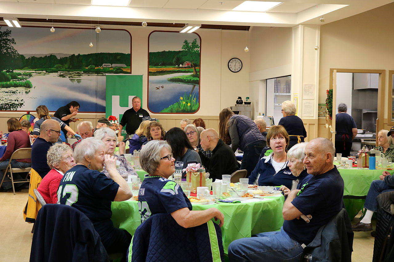 Sno-Valley Seniors enjoying a Blue Friday lunch during the 12 Days of Goodness event on Dec. 13. Stephanie Quiroz/staff photo