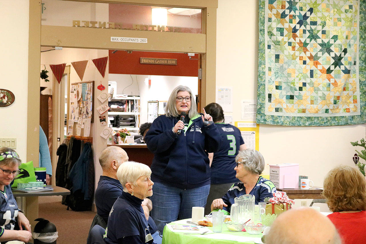 Founder Suzanne Parkins Newman talks about 12 Days of Goodness in Carnation on Dec. 13. Stephanie Quiroz/staff photo