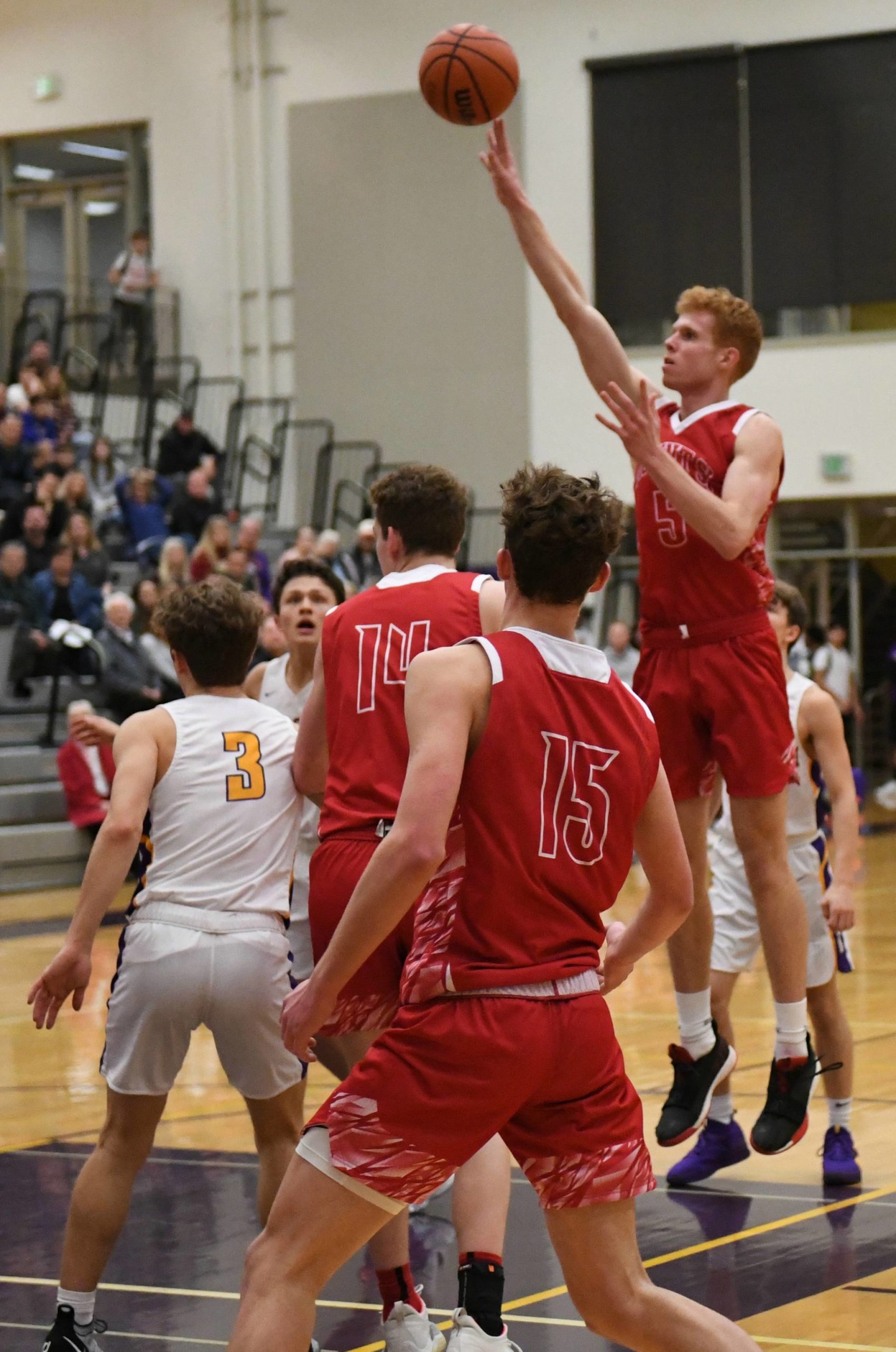 Mount Sis Jabe Mullins rises above the pack for a shot against Issaquah on Jan. 7. The Wildcats won, 53-39. Mullins led the Wildcats with 18 points. Mount Si (10-3 overall at press time) raised its league record to 7-0 at press time following wins over Woodinville, 58-44, on Jan. 10 and Inglemoor, 55-46, on Jan. 11. Courtesy of Calder Productions
