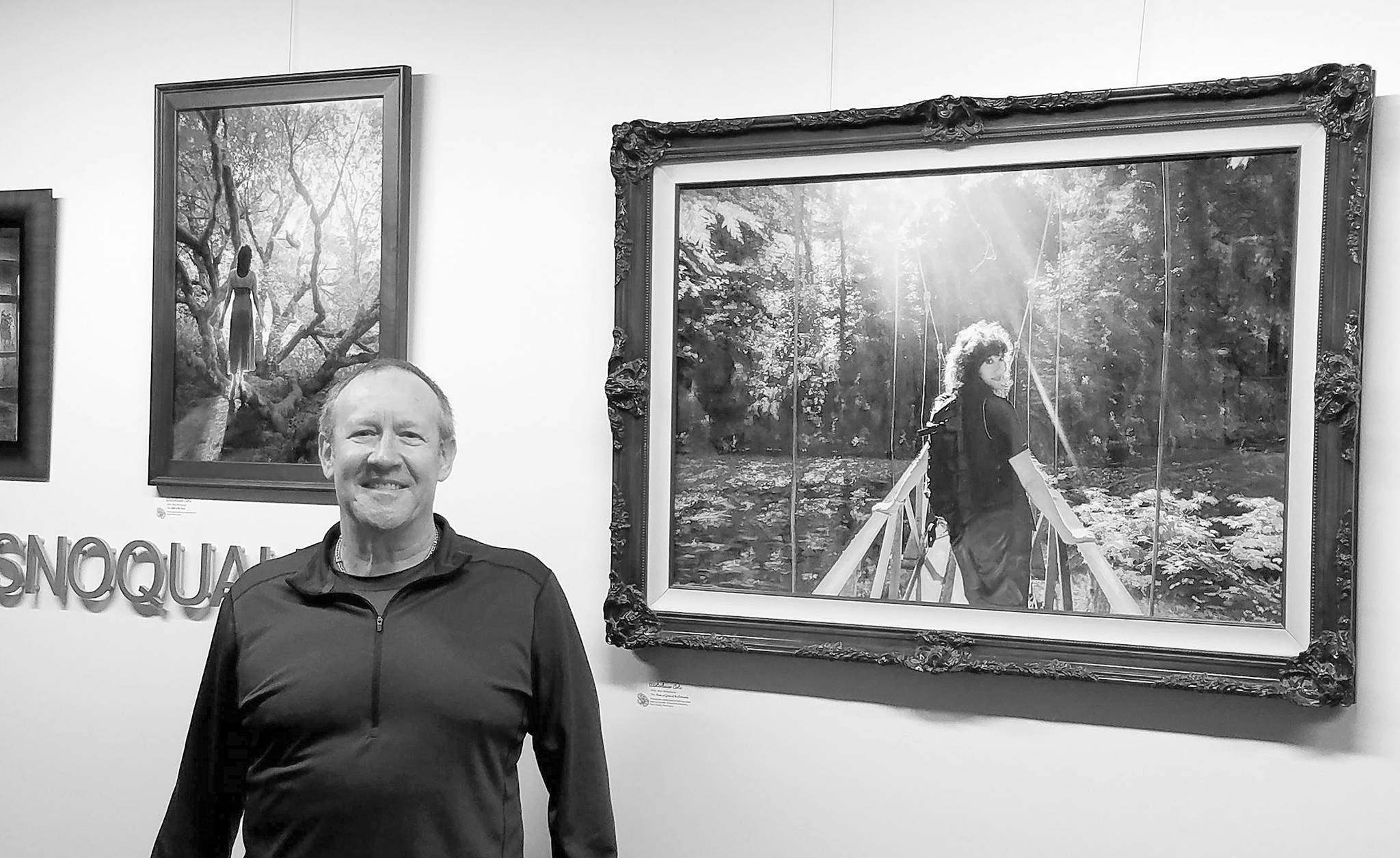 Courtesy photo                                Artist Mike Winterbauer at a showing of his artwork in Snoqualmie City Hall.