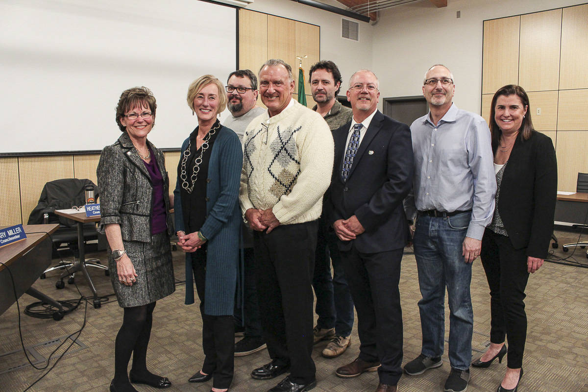 North Bend swore in its new mayor and new council members at its Jan. 7, 2020 meeting. From left: King County Councilmember Kathy Lambert, North Bend council members Mary Miller, Chris Garcia, Ross Loudenback, Mayor Pro Tem Brenden Elwood, North Bend Mayor Rob McFarland, council members Alan Gothelf and Heather Koellen.