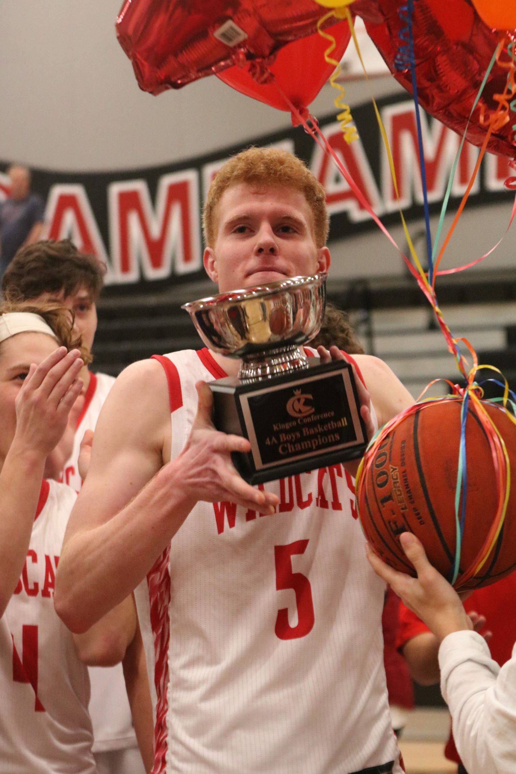Mount Sis Jabe Mullins celebrates his birthday and the Wildcats 4A KingCo Tournament championship on Saturday at Sammamish High. Andy Nystrom/ staff photo