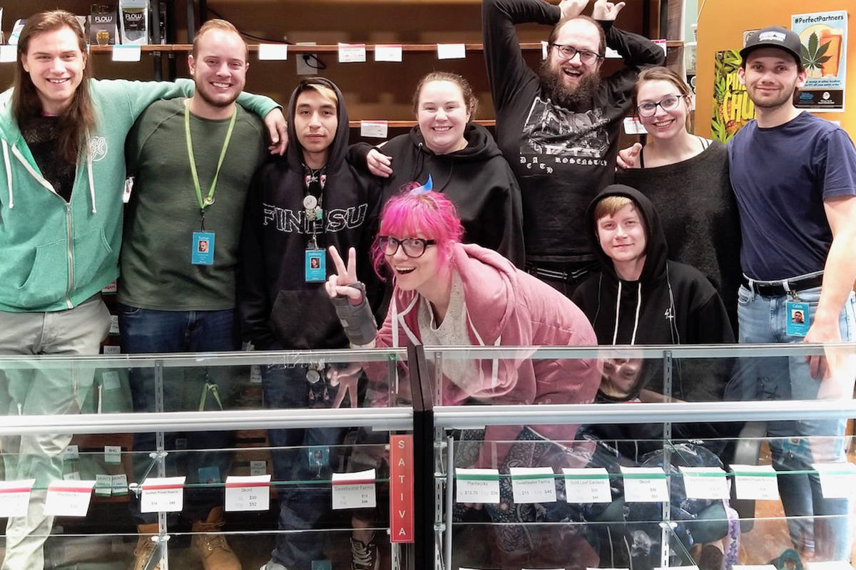 Staff from Hashtag Cannabis in Redmond gather for a group photo. Many of the experienced staff who were laid off when the store closed at the previous location will return when Hashtag opens its large new storefront in downtown Redmond, sometime in April. Photo by Kim Bevington