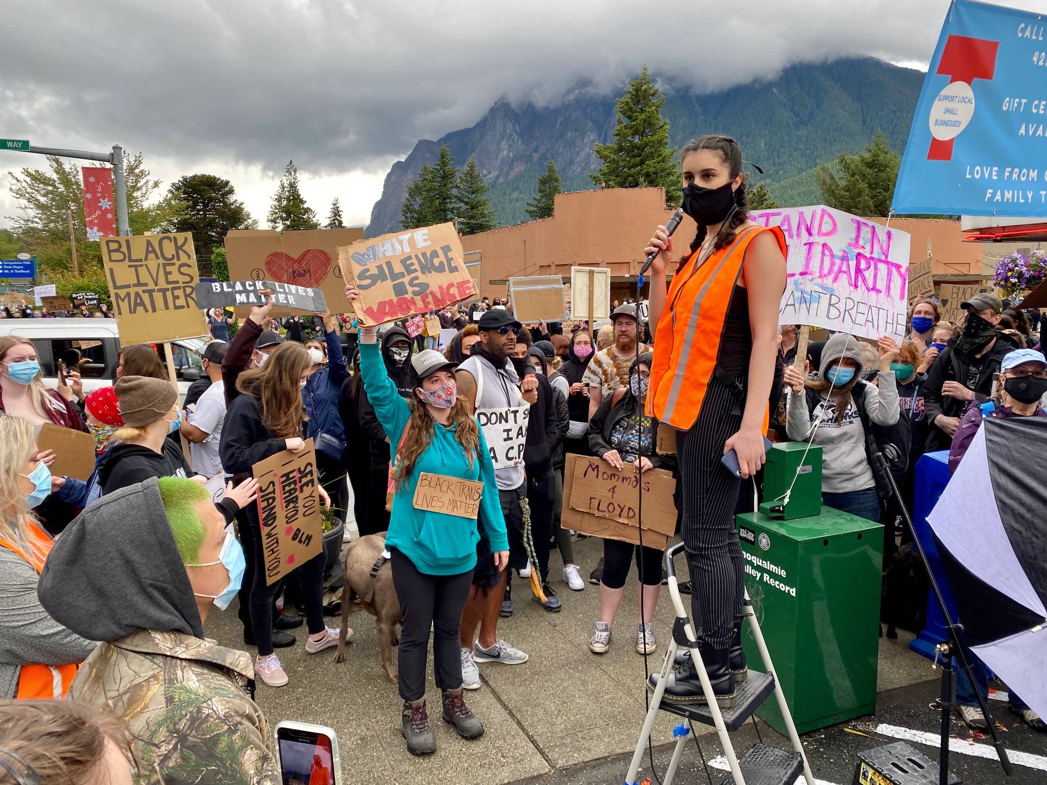 Salma Habashi, pictured here on the ladder, is a Senior at Mt. Si High School. She organized the June 6 march in support of other Black Lives Matter protests happening across the country in an effort to educate people. Photo contributed by Noha Habashi.