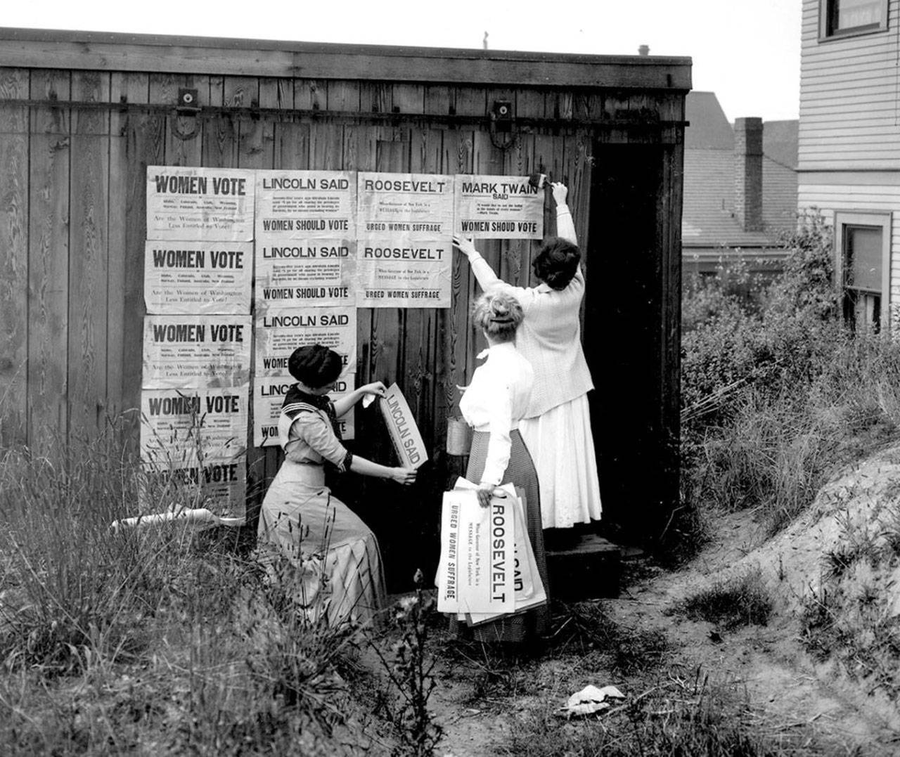Washington State Archives                                The Washington Equal Suffrage Association places posters in Seattle in 1910 to promote women’s suffrage.