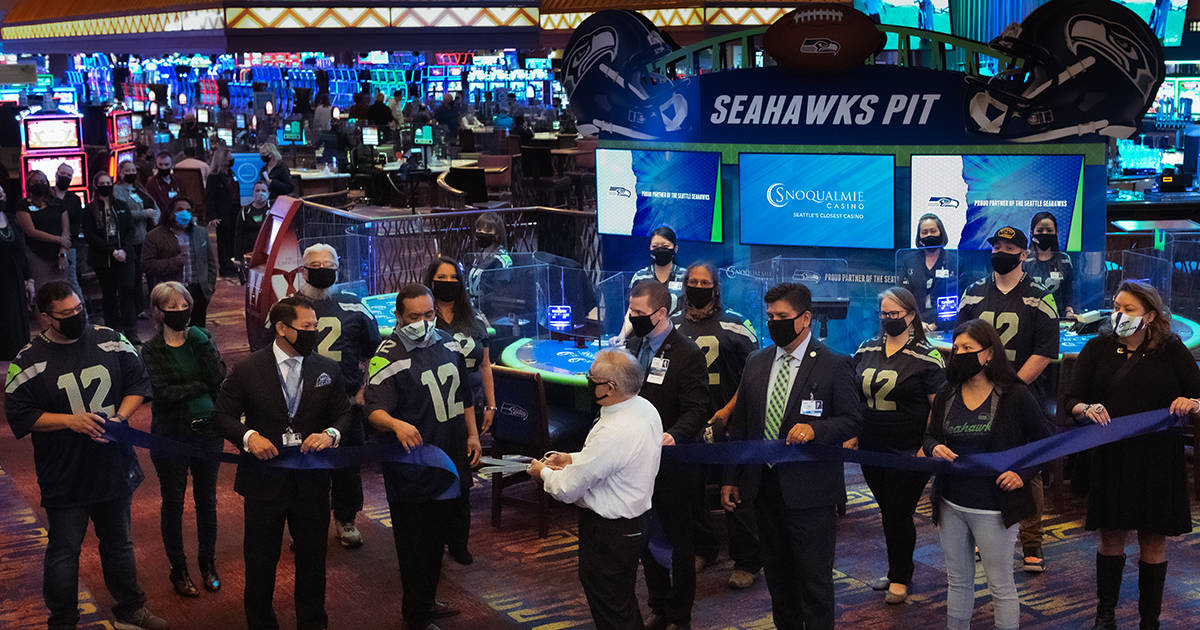 Snoqualmie Casino unveiled the first immersive Seahawks-branded table game experience Sept. 18 in a ribbon cutting dedication with Snoqualmie Tribe Council members and Snoqualmie Casino executives. Courtesy photo