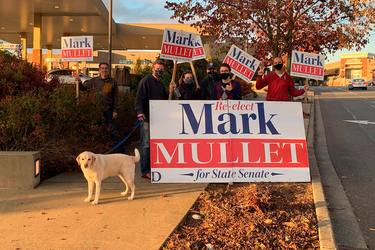 Mark Mullet and supporters wave signs Oct. 28. Courtesy photo