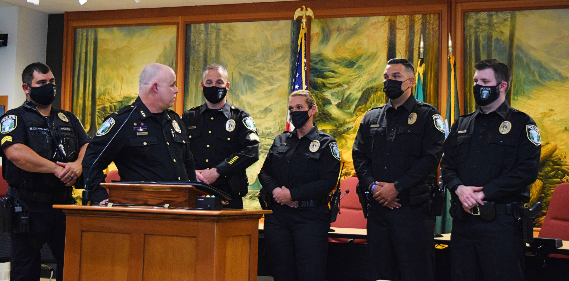 Photo by Conor Wilson/Valley Record
Police Chief Perry Phipps (center), speaks to new hires and promoted sergeants at the Oath of Office ceremony Aug. 9. Pictured left to right: Sgt. Nigel Draveling, Sgt. Jason Weiss. Officers: Pamela Mandery, Ricard Velasquez and James Aquirre.