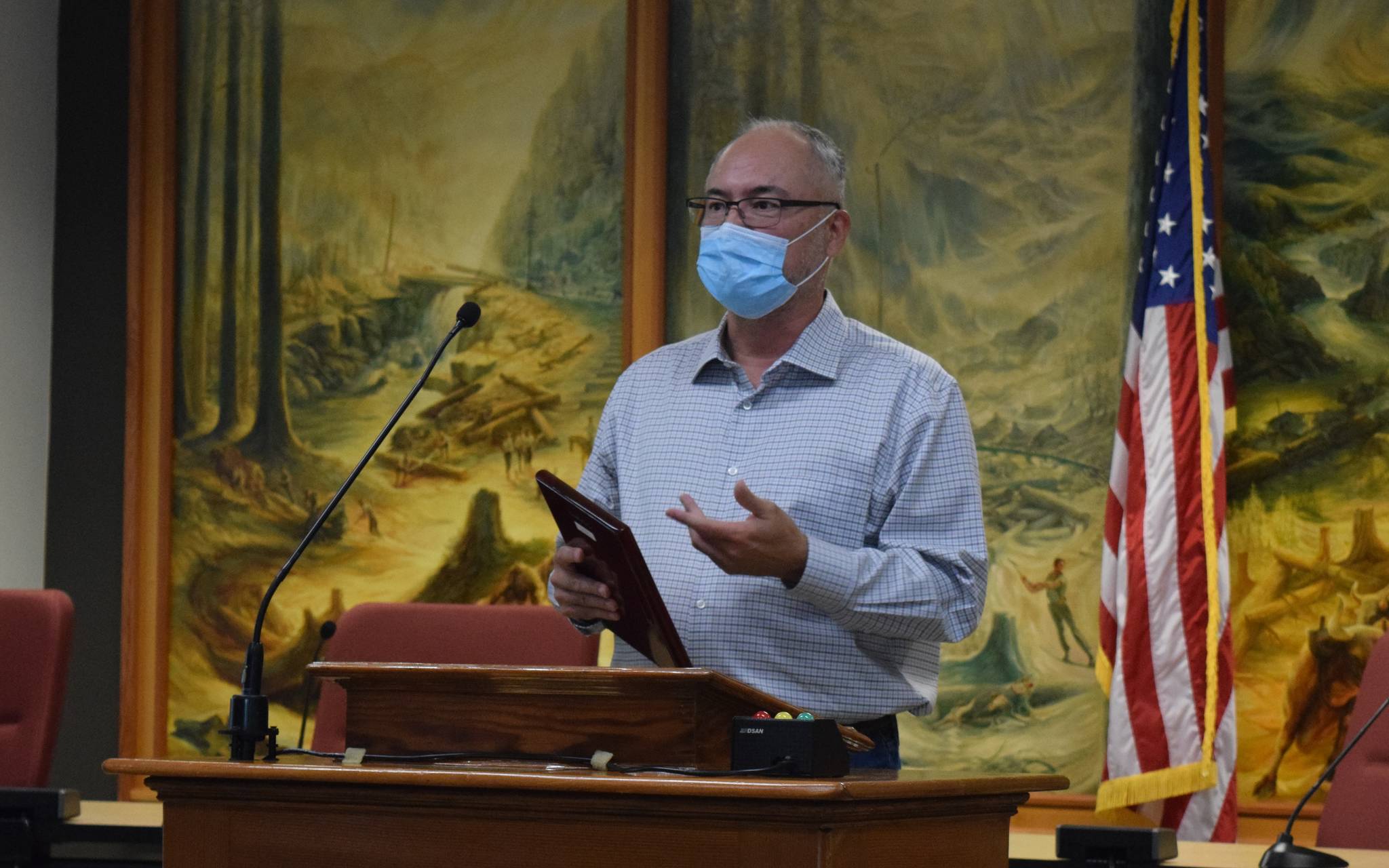 Photo by Conor Wilson/Valley Record
SnoValley Chamber President, Earl Bell, speaks at the Aug. 9 Snoqualmie city council meeting, after receiving a community service award from the city.