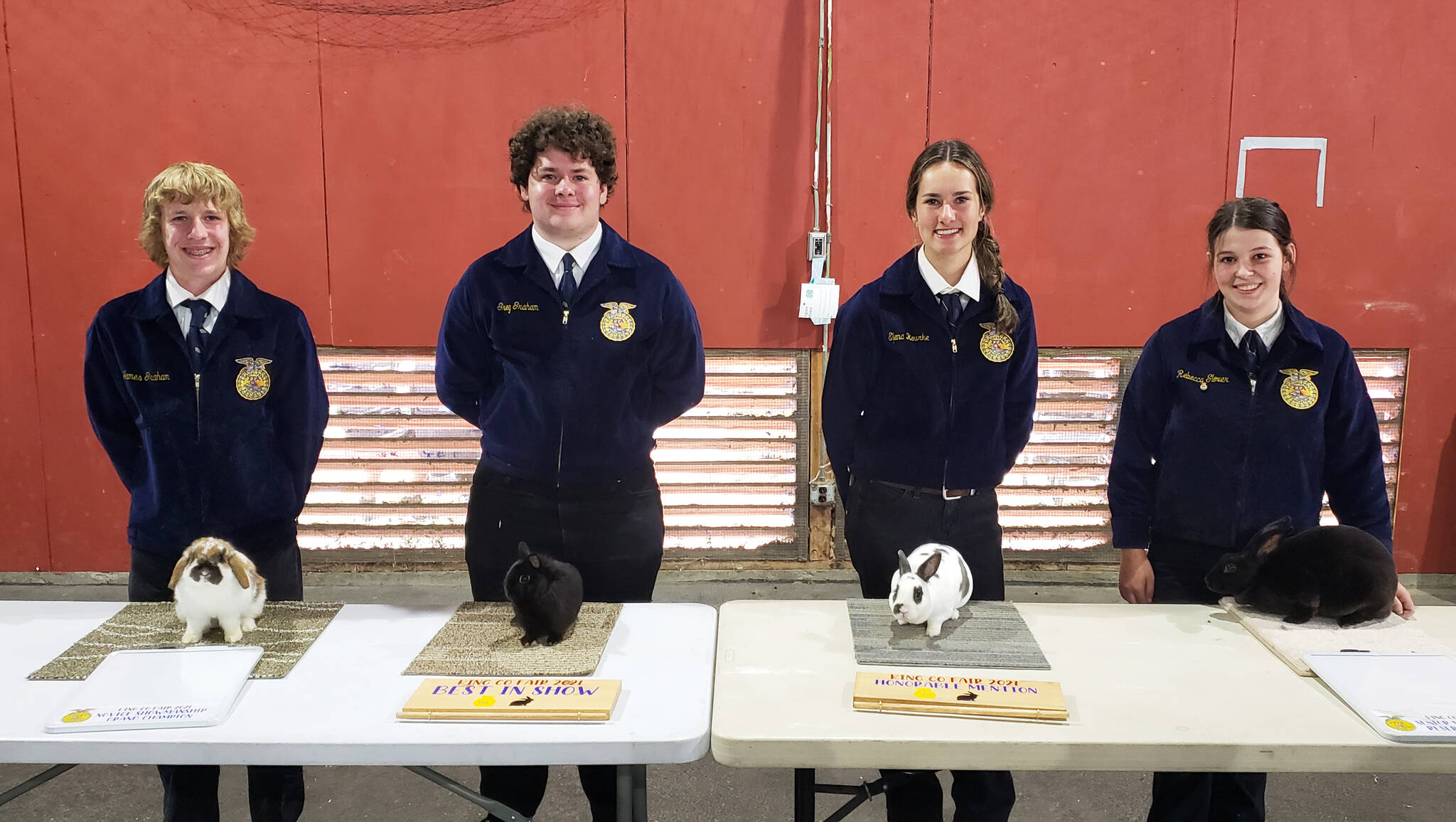 Photo Courtesy of the Snoqualmie Valley School District
Mount Si FFA students present their rabbits, from left: James Graham, Greg Graham, Elena Rourke, and Rebecca Glover.
