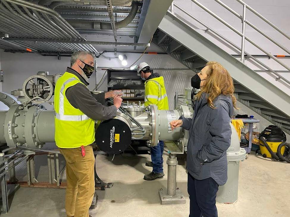 U.S. Rep. Kim Schrier (D-08) speaks with Waste Water Treatment Plant Manager Jeff Leamon while visiting North Bend. Courtesy of the City of North Bend.
