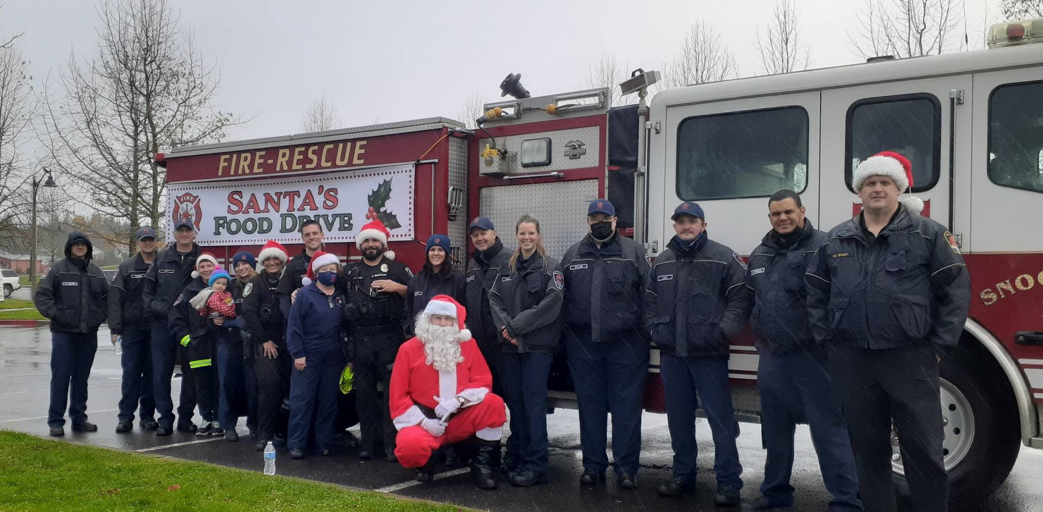The Snoqualmie Fire and Police Department participated in the second annual Santa Parade and Food Drive on Dec. 18, to benefit the Helping Hands Ministry Backpack Program. The group provided food for over 200 kids who face food insecurity and provided gifts to 262 kids in the Valley. Courtesy photo