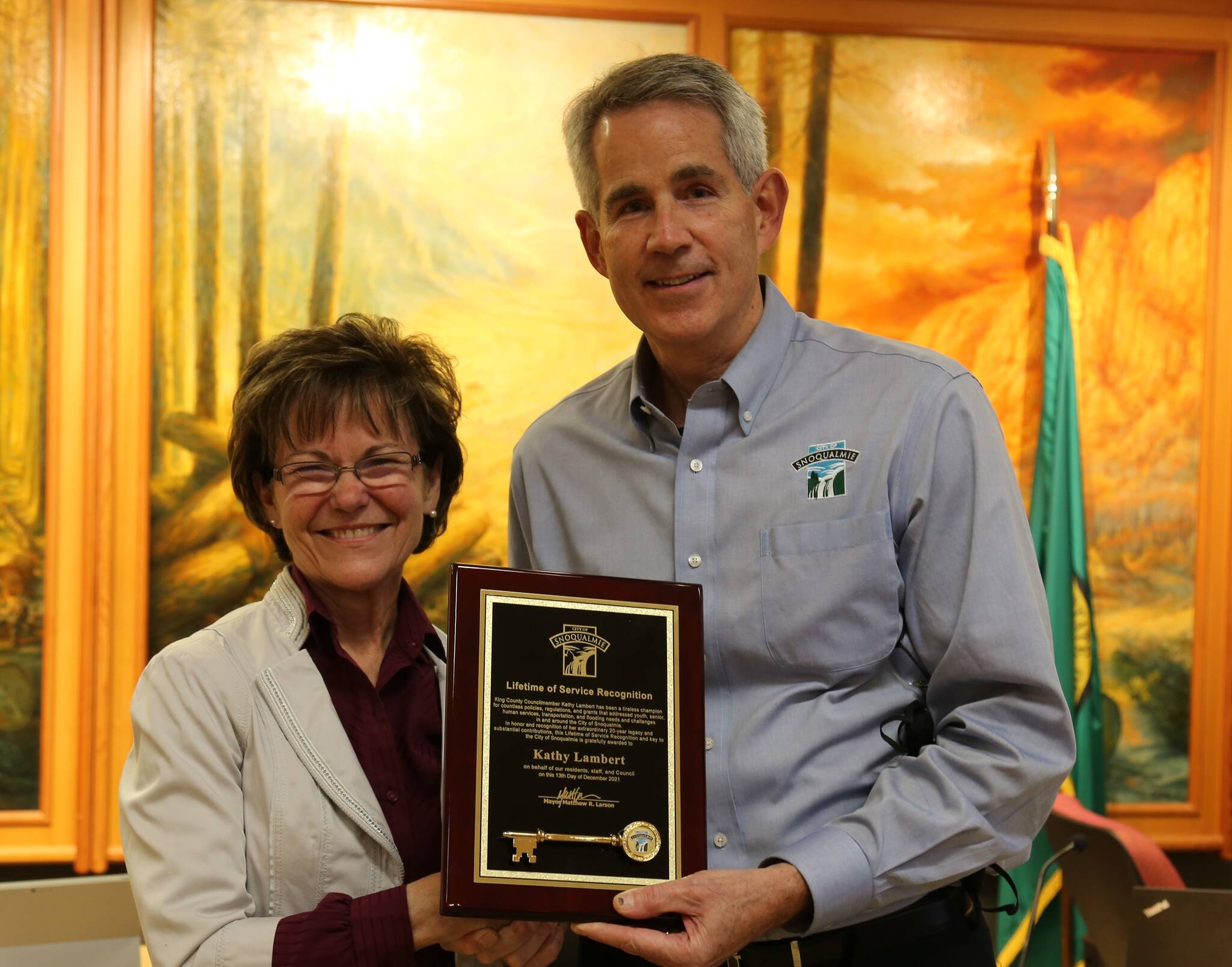 Courtesy photo
Kathy Lambert receives a key to the city from Snoqualmie Mayor Matt Larson on Dec. 13.