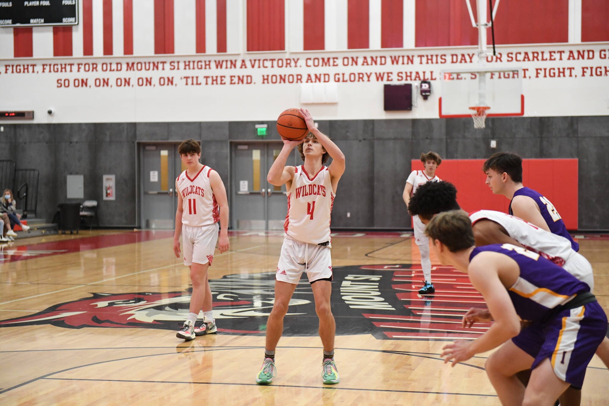 Sophomore Trevor Hennig shoots a free throw. Photo courtesy of Calder Productions.