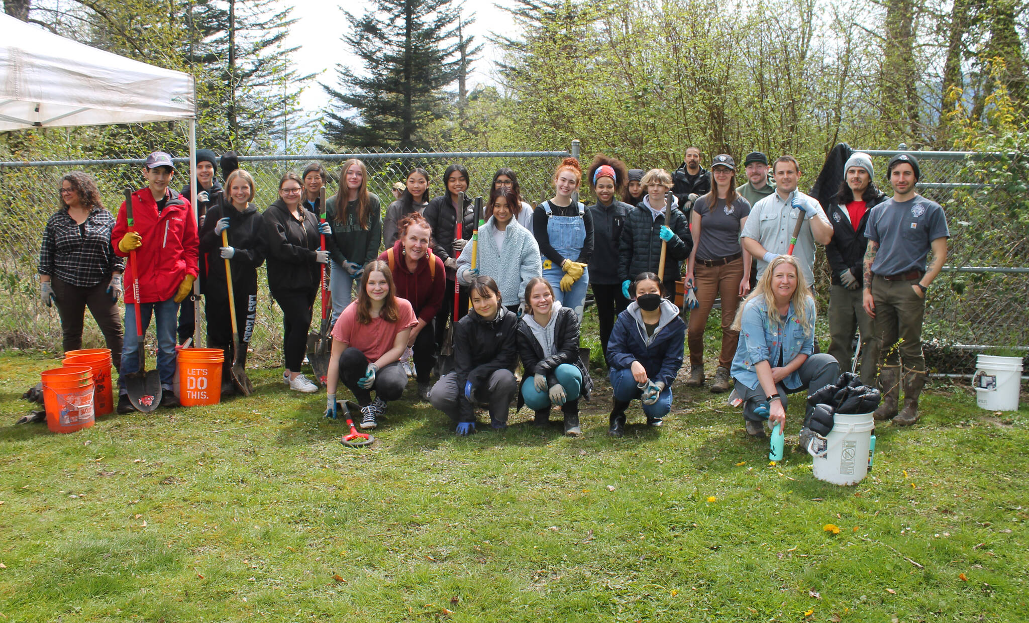 Photo courtesy of the Snoqualmie Valley School District. Members of Mount Si High Schools Green Team and the Snoqualmie Tribe Habitat Restoration Team partnered up to perform a restoration event at Kimball Creek Slough on Earth Day. The two groups, alongside community members, planted native trees and shrubs and removed English ivy, blackberry and other invasive plants.