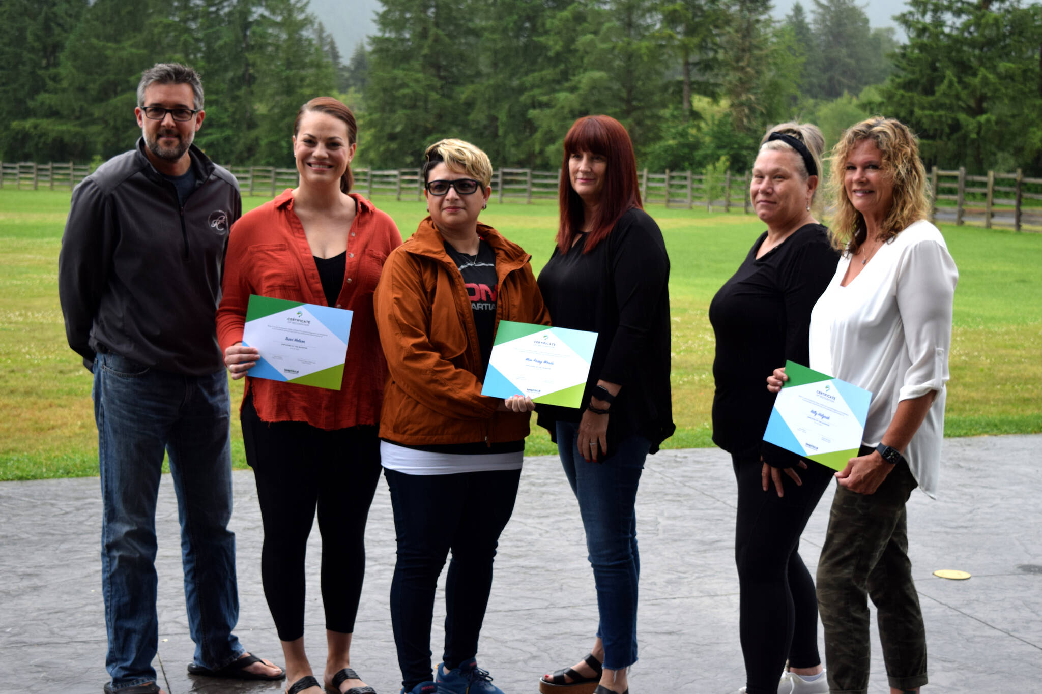 Winners of the Keep It Local Snoqualmie Valley contest and those who nominated them pose for a photo on June 29. From left: Ryan Seal and Traci Nelson of Sigillo Cellars. Miss Russy Woods and Karen Bowers of DMW Martial Arts and Kimberlea Miller and Kelly Holyoak of Wildflower Bistro. Photo by Conor Wilson/Valley Record.