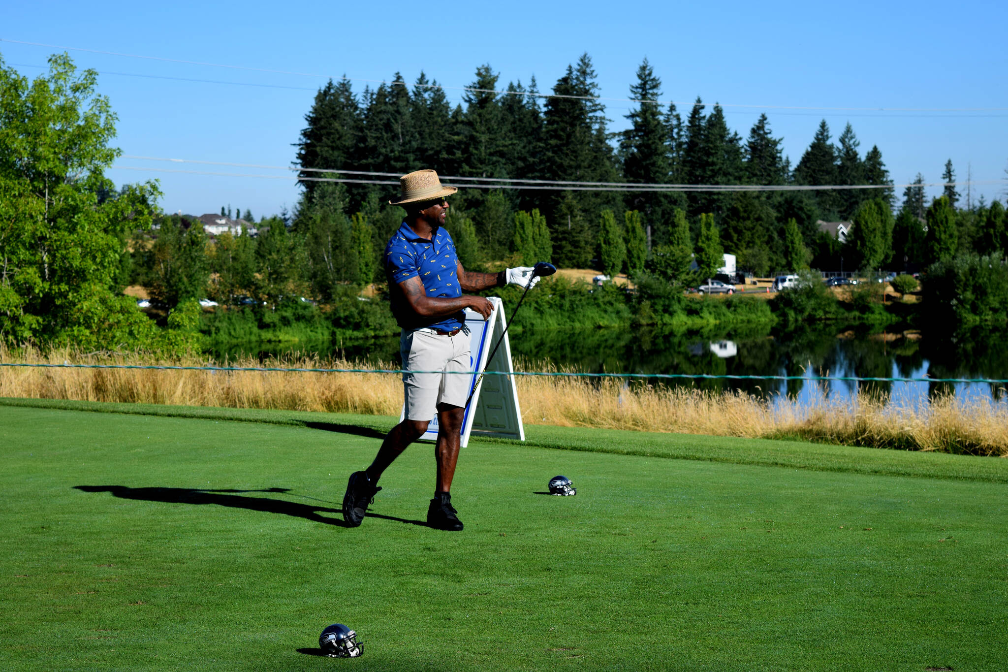 Former Seahawks safety Jordan Babineaux tees off on the tenth hole at the Seahawks Rumble at the The Ridge charity fundraiser on Aug. 8. Photo by Conor Wilson/Valley Record