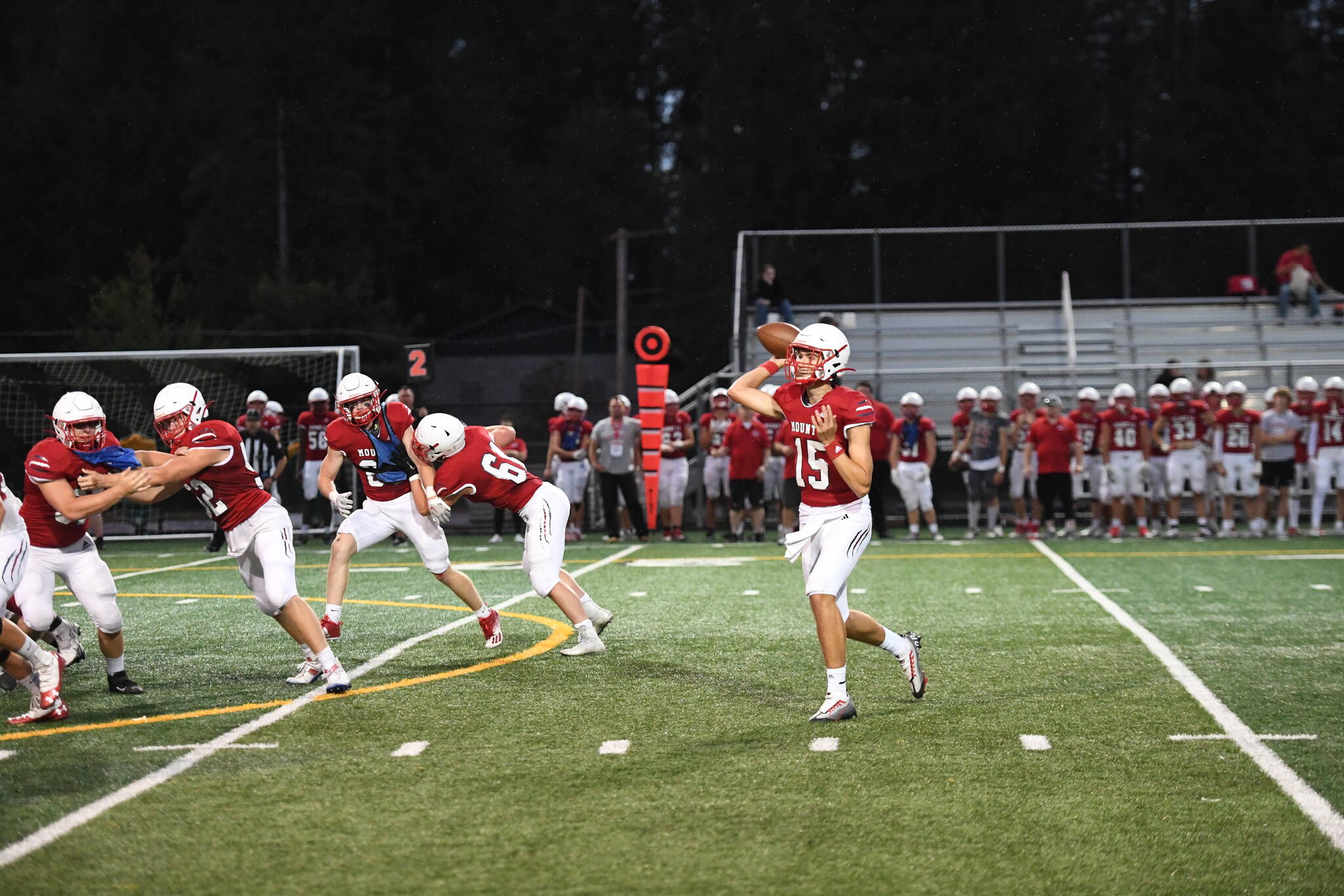 Senior Quarterback Cyrus Turley throws a pass in an inter-squad game on Aug. 26. Photo Courtesy of Calder Productions
