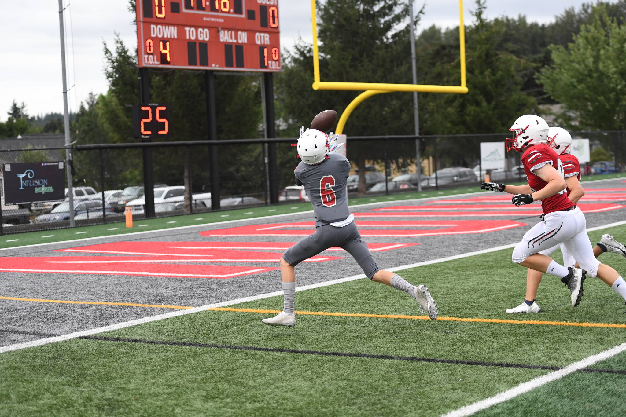 Senior wide receiver Ryder Wiess receiver makes a catch in an inter-squad game on Aug. 26. Photo Courtesy of Calder Productions.