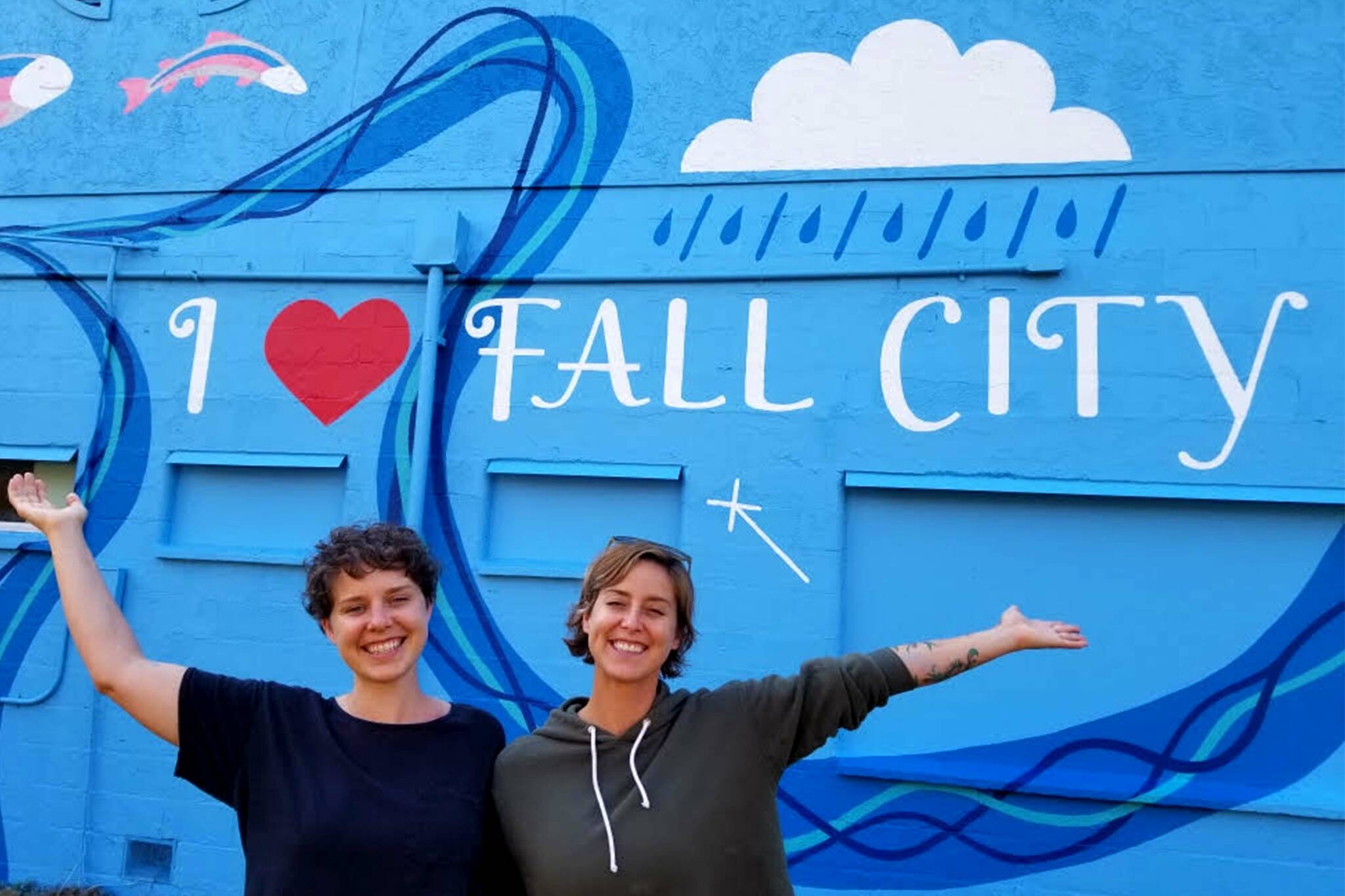 Artists Krimsey Lilleth (right) and Jess Joy stand in front of their mural. Photo courtesy of Krimsey Lilleth.