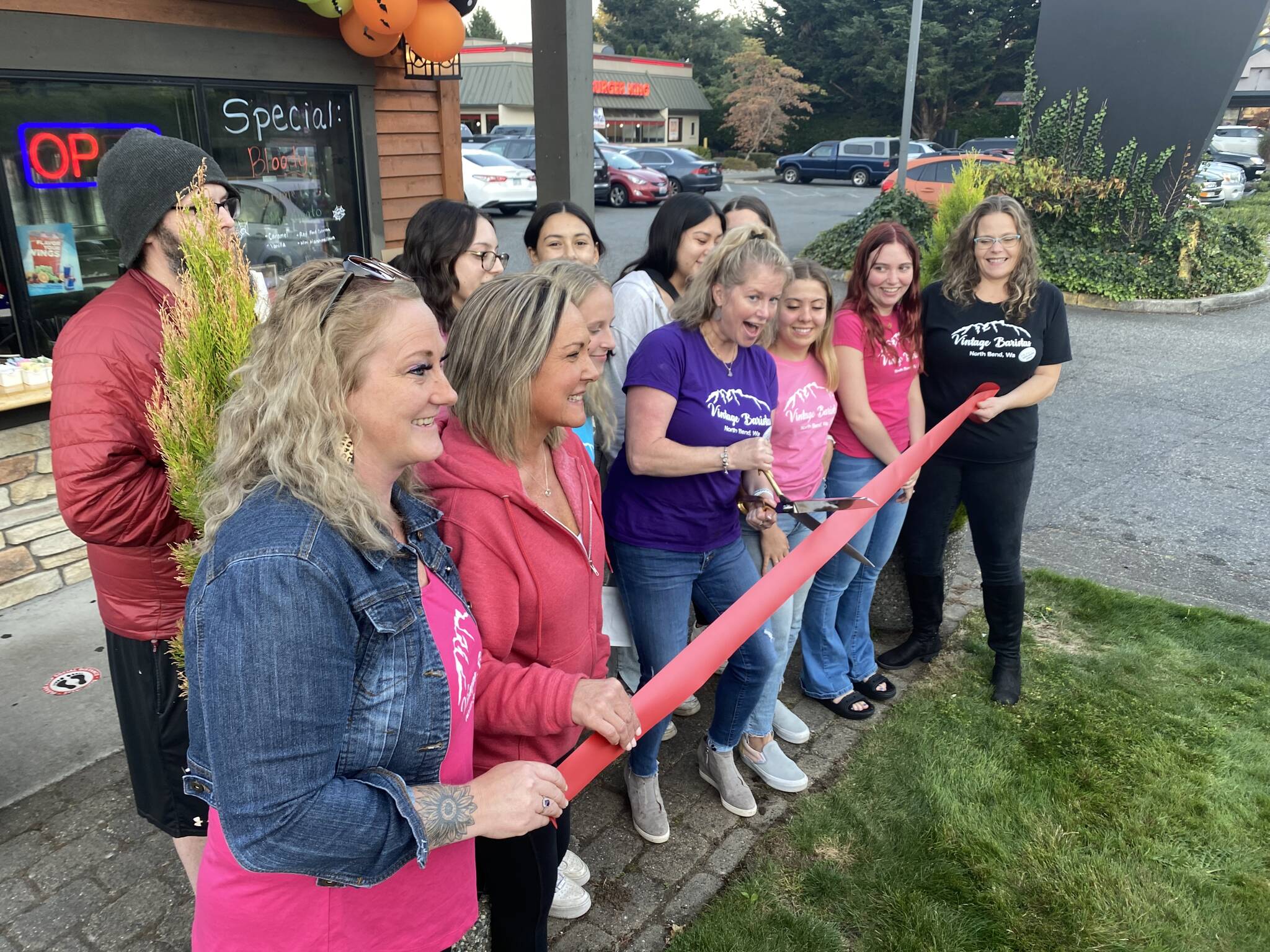 Tahvia Bridgman, owner of Vintage Baristas, celebrates the grand opening of their new location with team members on Oct. 12. Photo Courtesy of the SnoValley Chamber of Commerce.
