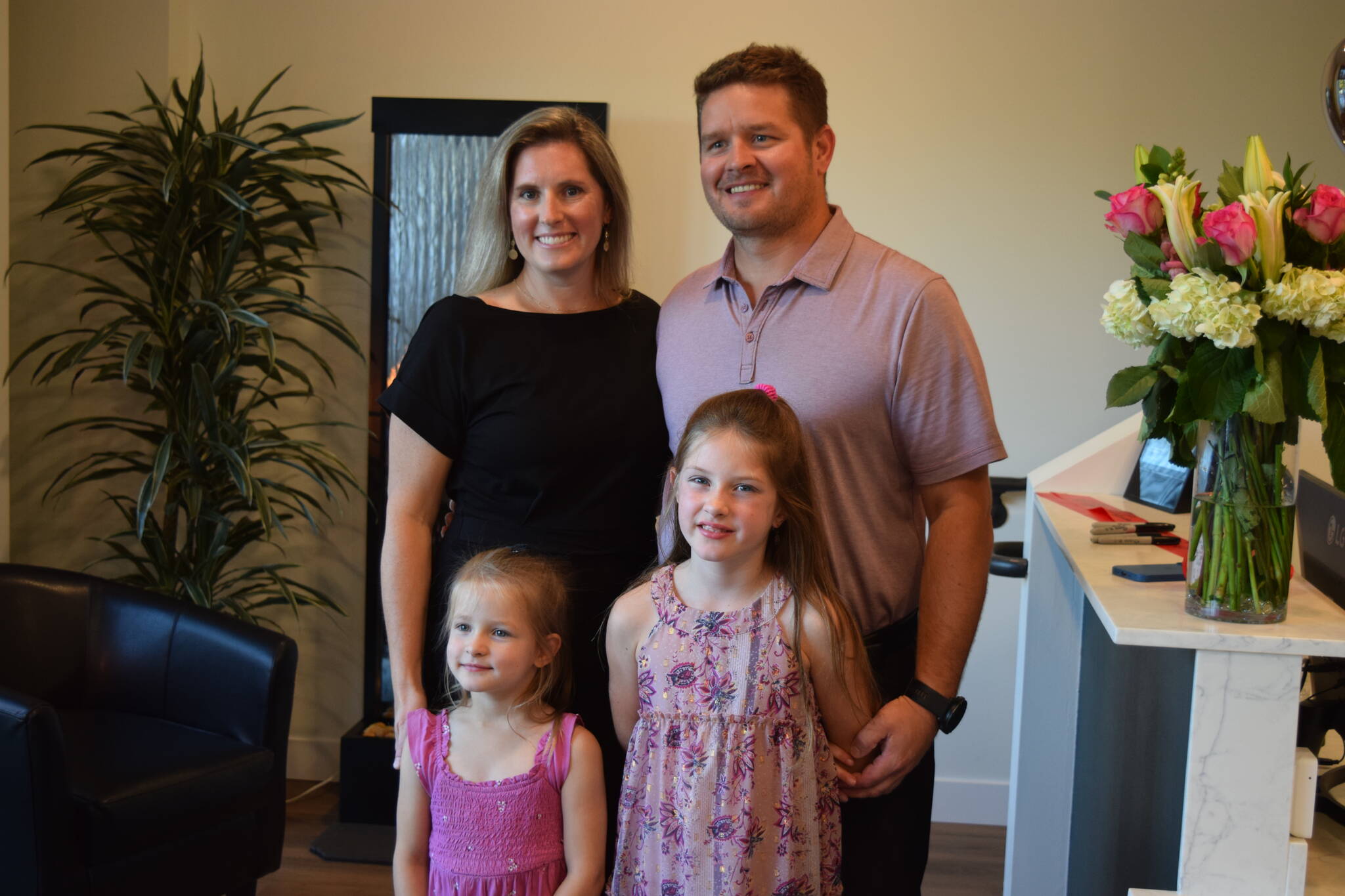 Dr. Stephenie Tornberg of ROW Health poses for a photo alongside husband Ben and two daughters, Madison and Teagan. Photo by Conor Wilson/Valley Record