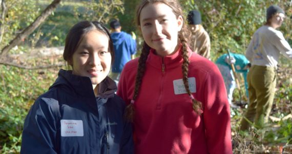 Mount Si Green Team members Savonnah Mitchell and Jasmine Lao at a Kimball Creek clean-up on Oct. 29. Photos by Conor Wilson/Valley Record