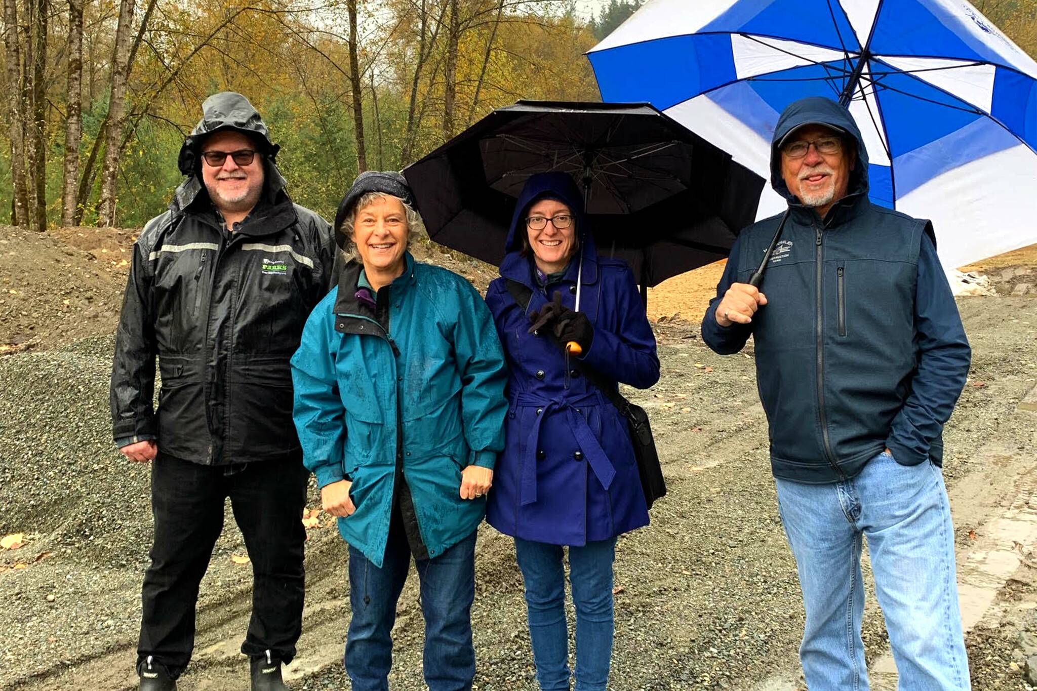 King County Parks Program Manager TJ Davis tours Preston Mill Park with members of the Fall City Historical Society. From left: Davis, Cindy Parks, Sarah Martin and Rick Divers. Photo courtesy of Kathy Lambert