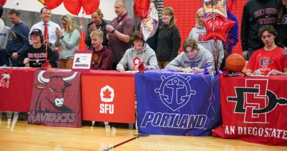 Photo Courtesy of the Snoqualmie Valley School District
Twelve Mount Si High School student-athletes sign National Letters of Intent or signing forms to play collegiate sports at ceremony on Nov. 17.