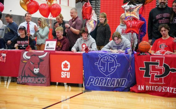 Photo Courtesy of the Snoqualmie Valley School District
Twelve Mount Si High School student-athletes sign National Letters of Intent or signing forms to play collegiate sports at ceremony on Nov. 17.