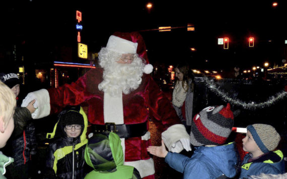 Courtesy photo.
Santa greets excited children in downtown North Bend.