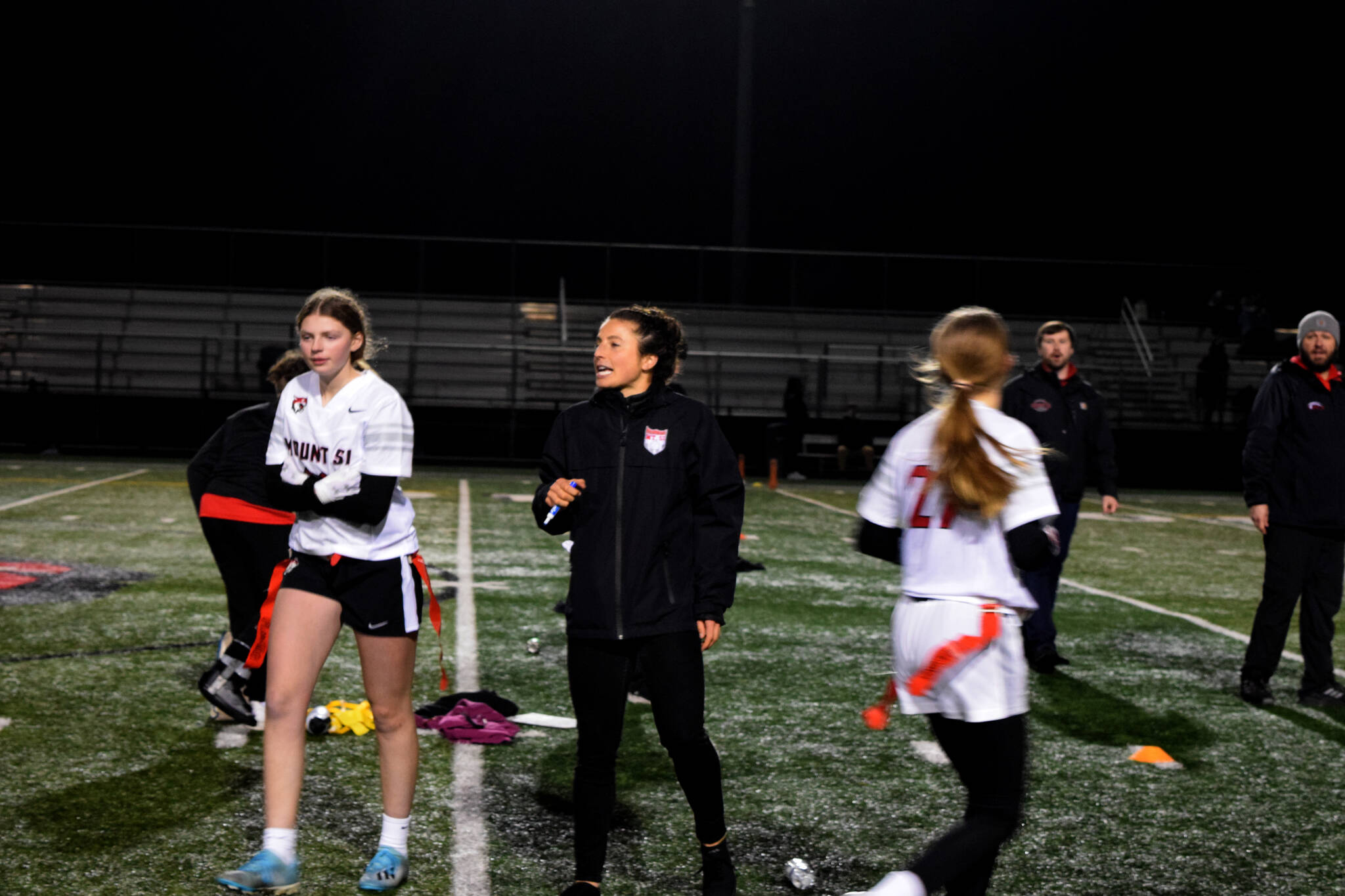Girls flag football head coach Kelly Besmer talks to athletes on Jan. 25. Photos by Conor Wilson/Valley Record