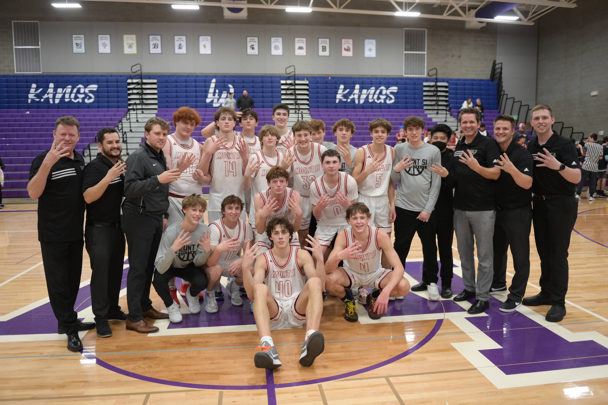 The Mount Si Boys Basketball team celebrates winning the KingCo League title on Feb. 4 at Lake Washington High School. Photo courtesy of Calder Productions.