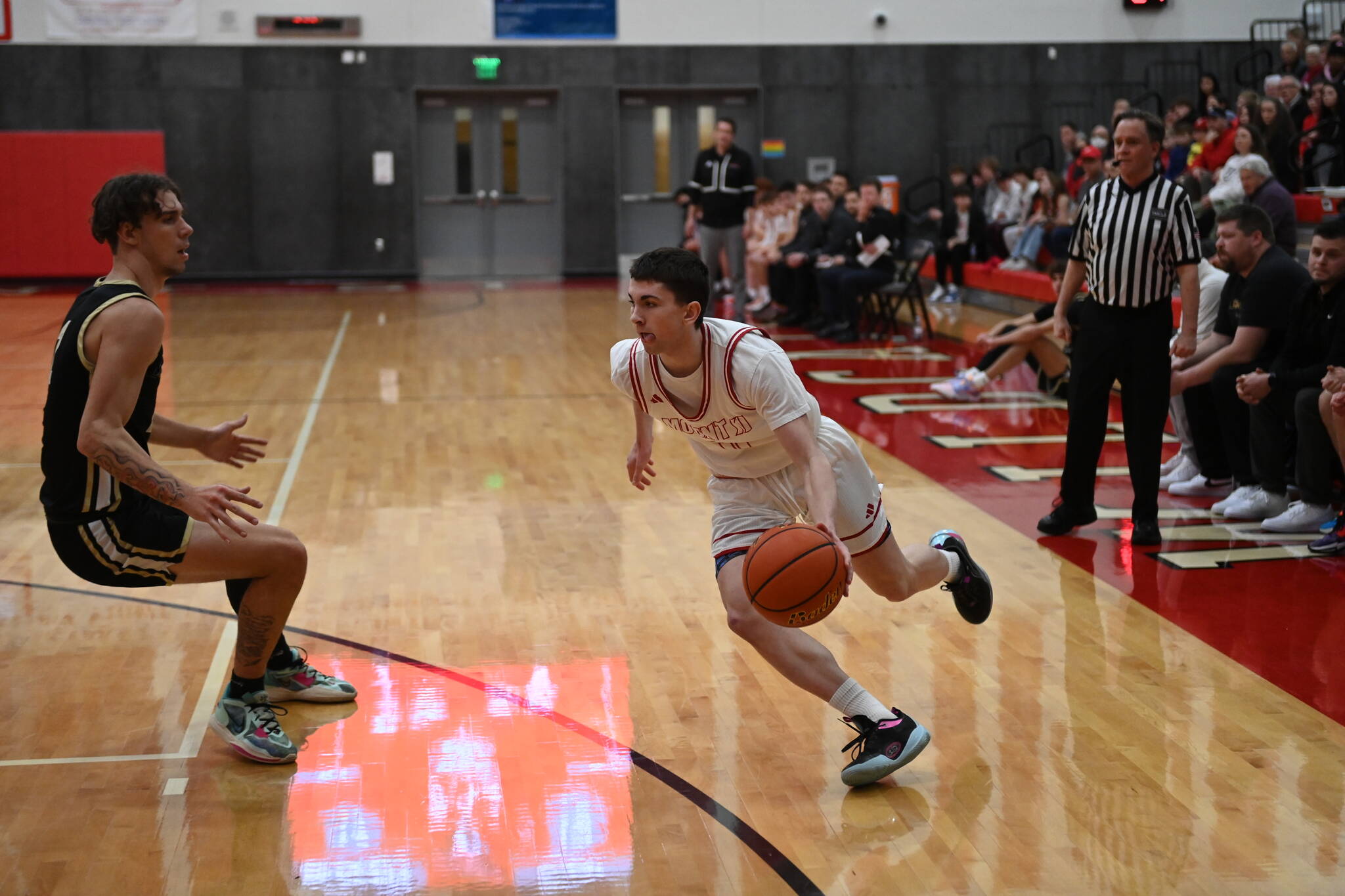 Jake Bonnofsky dribbles around a defender in the Wildcats victory over Lake Stevens. Photo Courtesy of Calder Productions.