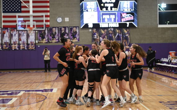 The Mount Si Girls basketball team celebrate after victory over Lake Stevens on Feb. 16 sends them to the state tournament. It will be their first appearance at state in nearly 30 years. Photo courtesy of Calder Productions.