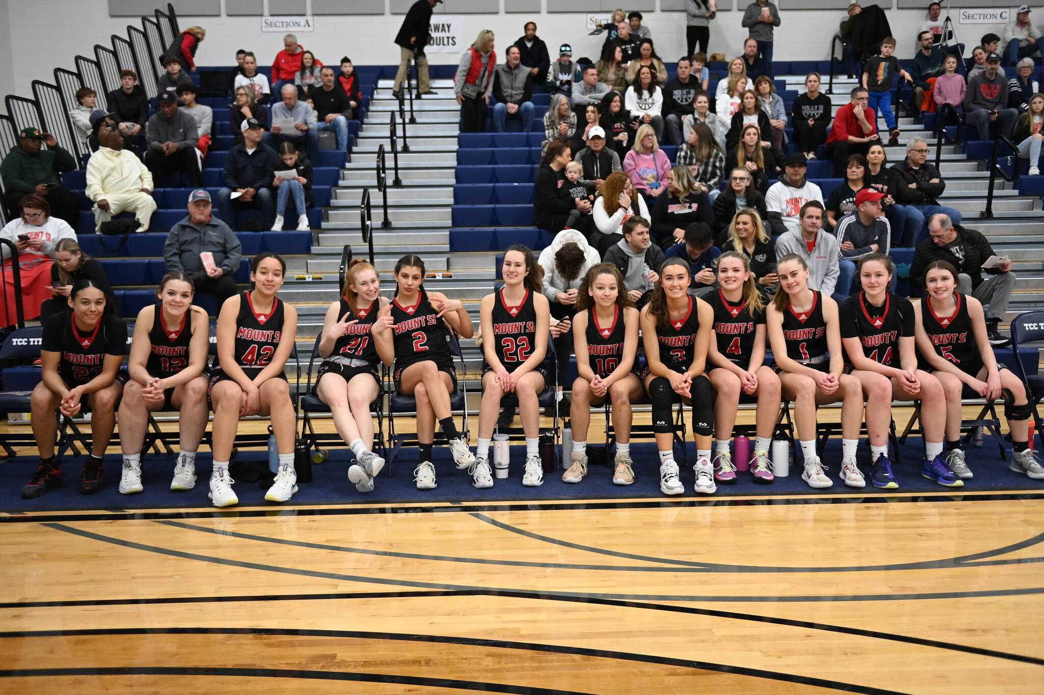 The Mount Si girls basketball team poses for a photo before playing Bellarmine Prep on Feb. 25. Photo courtesy of Calder Productions.