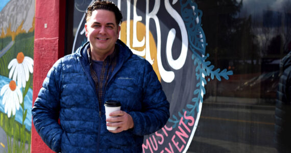Greg Jamiel, founder of SnoValley Pride, stands in front of Miller’s in Carnation. Photo by Conor Wilson/Valley Record