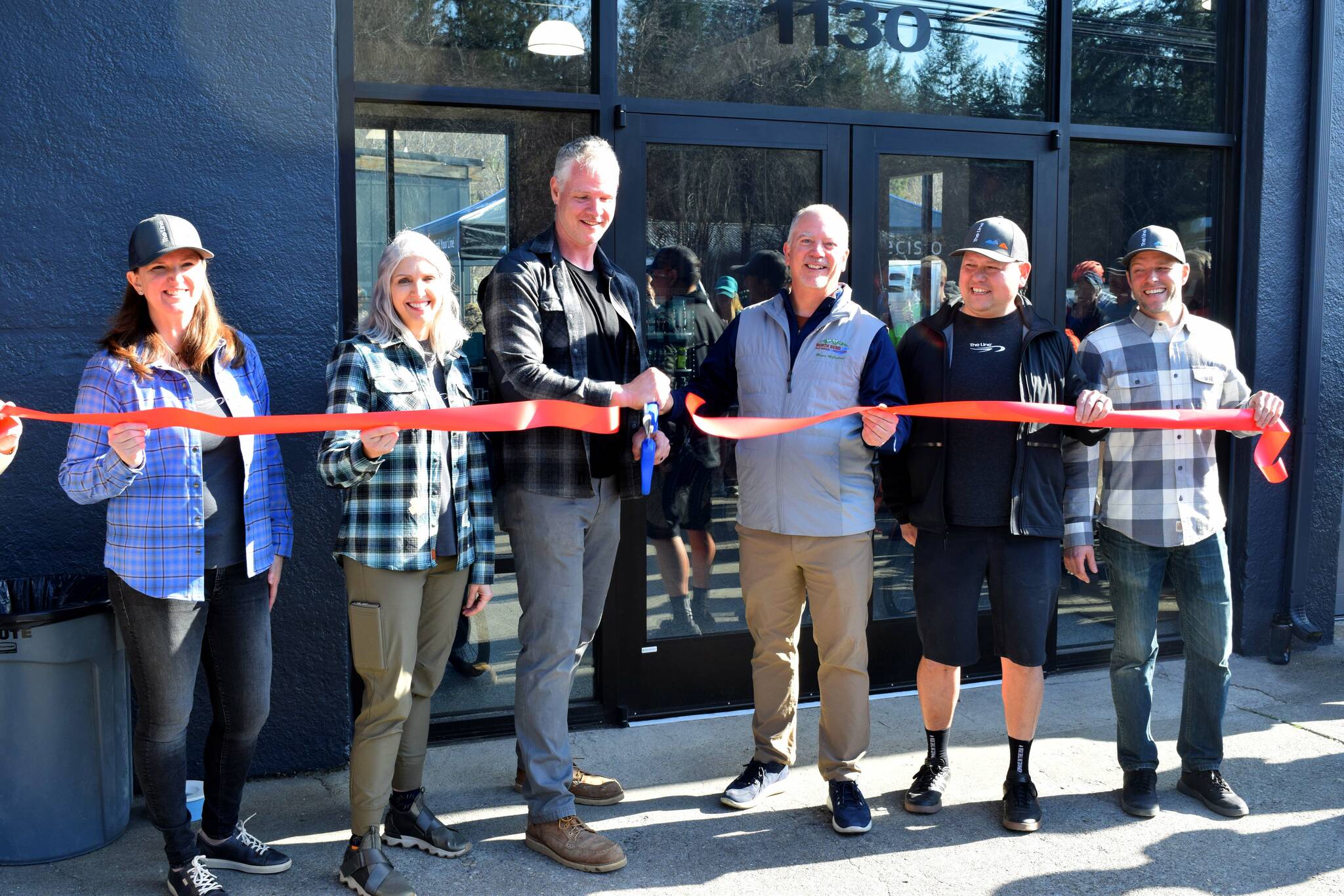 Owners of The Line Bike Experience at their grand opening on March 18. From left: Alex Kunz, Sheryl Tullis, Michael Kunz, North Bend Mayor Rob McFarland, Steve Murakami and James Skinner. Photos by Conor Wilson/Valley Record