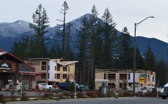 Conor Wilson / Valley Record.
Construction workers build the River Run Apartment Complex in North Bend in January.