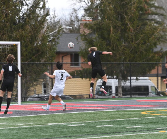 <p>Zach Ellis scores Mount Si’s first goal in a 2-0 win against Lynnwood on March 25. The Wildcats are now 1-3 on the season. Photo Courtesy of Calder Productions.</p>