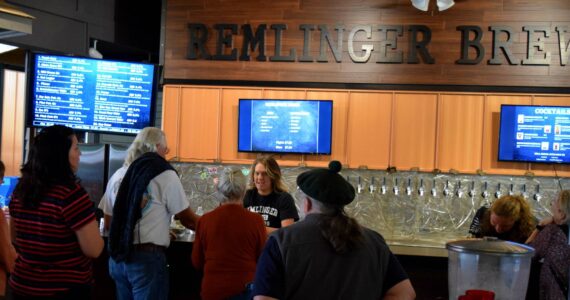 Patrons line up for drinks at Remlinger Farms Brewery. The brewery will host a fundrasier for Valley 104.9 on May 13. File photo Conor Wilson/Valley Record.