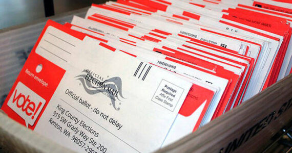 A stack of sealed voter ballots wait to be counted by King County Officials. File photo.
