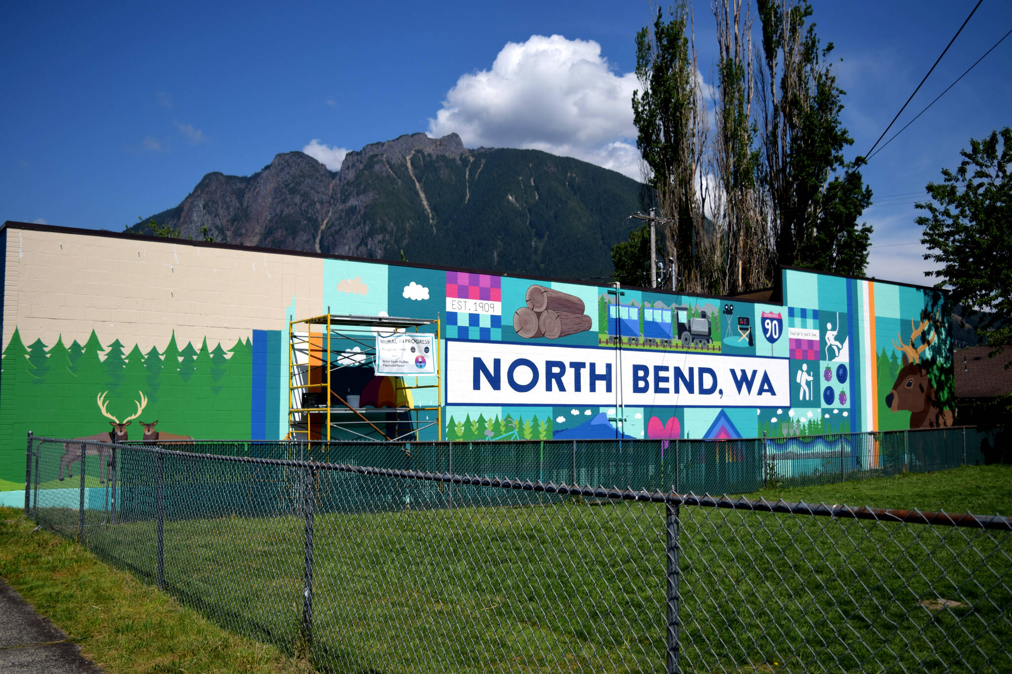 A mural by Sarah Hughes of North Bend on the side of Pressed on Main in North Bend.