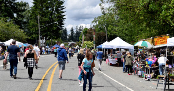 Residents walk along Redmond-Fall City Road. Photo by Conor Wilson/Valley Record