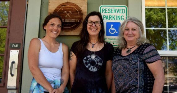 Photo by Conor Wilson/Valley Record.
Members of North Bend Art & Industry pose for a photo outside their new space in downtown North Bend. From left: Sarah Hughes, Ellen Rowen, Deb Landers. NBA&I will host an open house this Saturday.