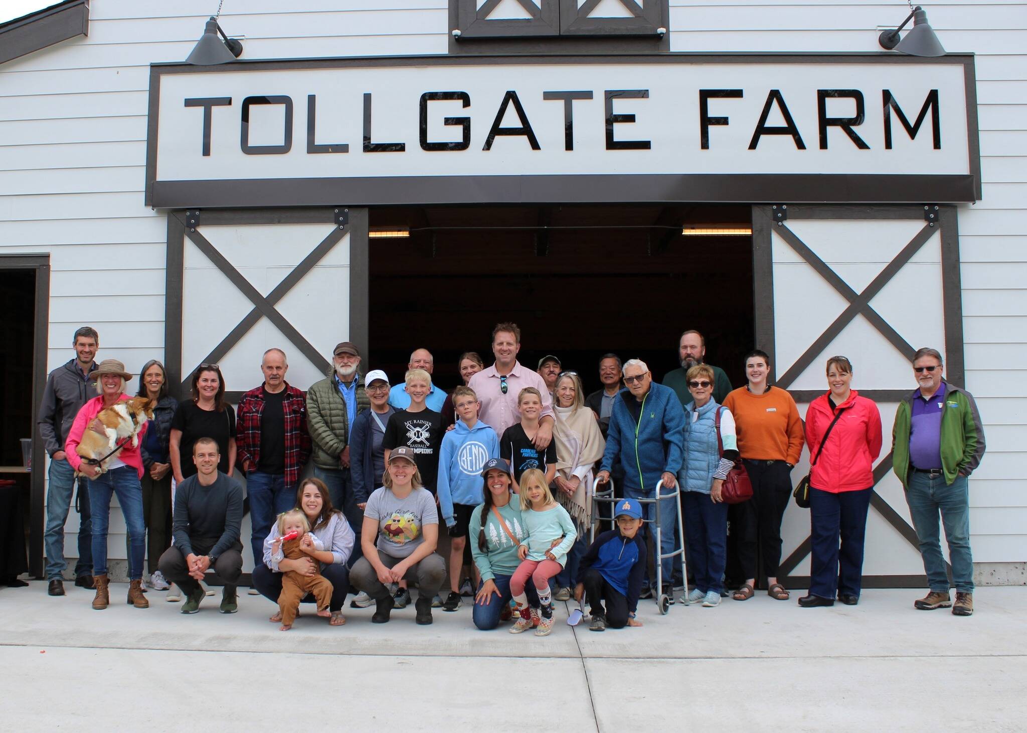 Officials with the Si View Parks District and City of North Bend pose for a photo outside the recently finished barn at Tollgate Farm Park. Courtesy photo.