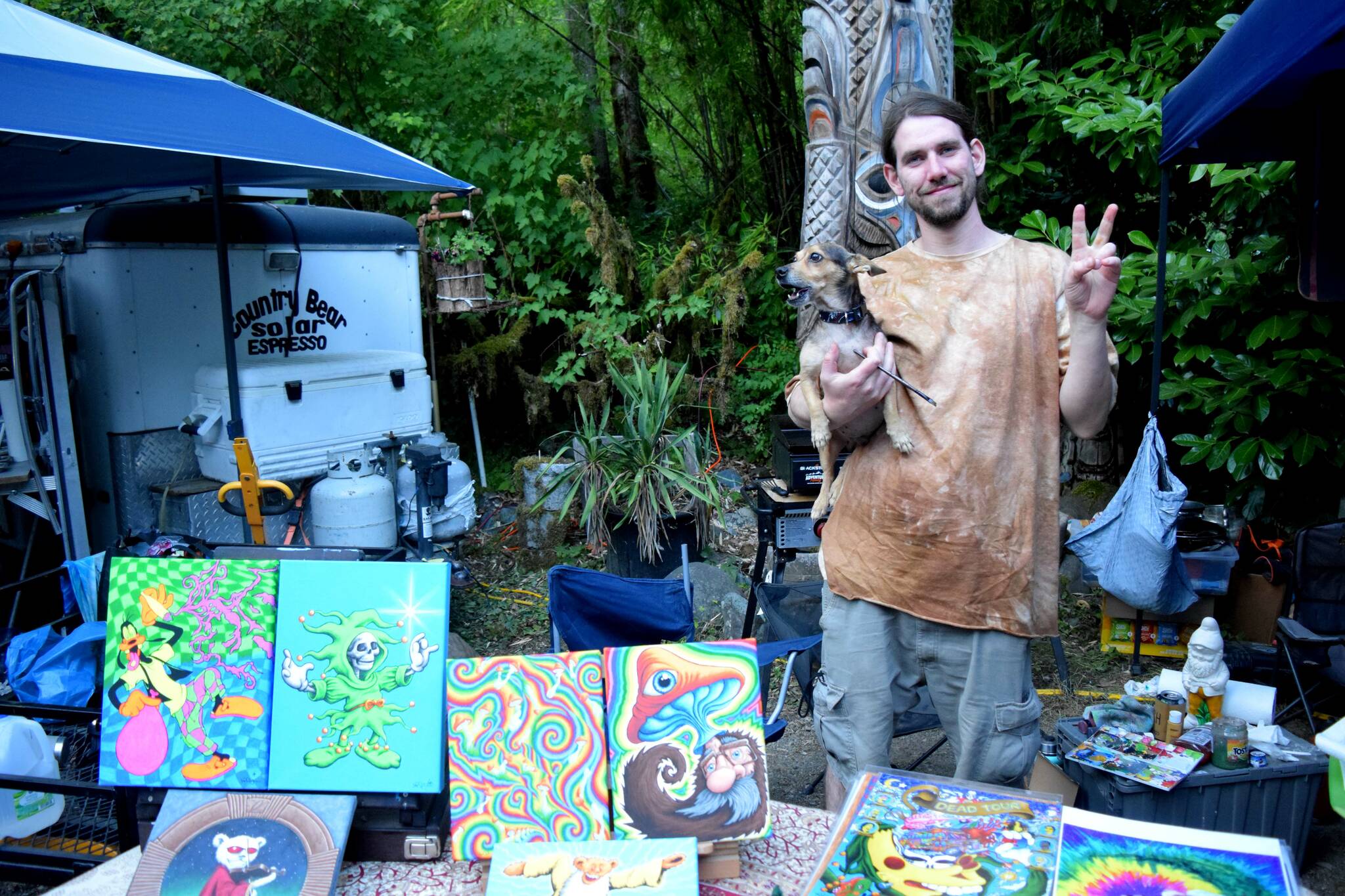 Artist James McNulty (@uncommonculturejames) poses with his work.