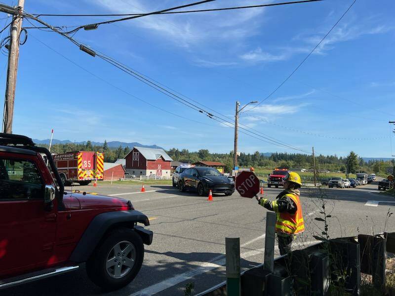 Eastside Fire & Rescue arrive after a car crash at the intersection of Tolt Hill Road and State Route 203 on Aug. 14. Photo courtesy of the city of Carnation.